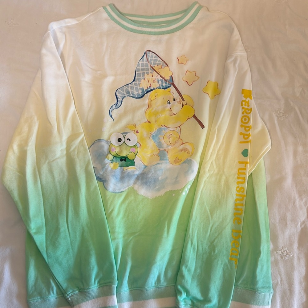Care bear sweatshirt. New without tag. Sz Med